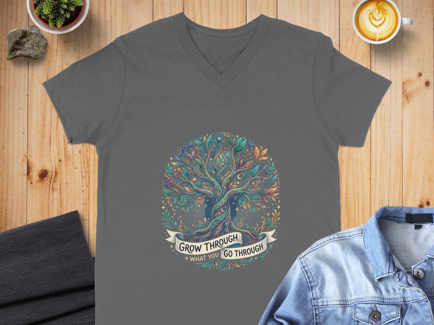 Gray v-neck t-shirt with "Grow Through What You Go Through" tree design.