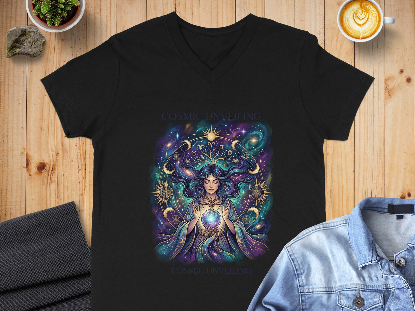 Black v-neck t-shirt featuring Cosmic Unveiling graphic with celestial woman.