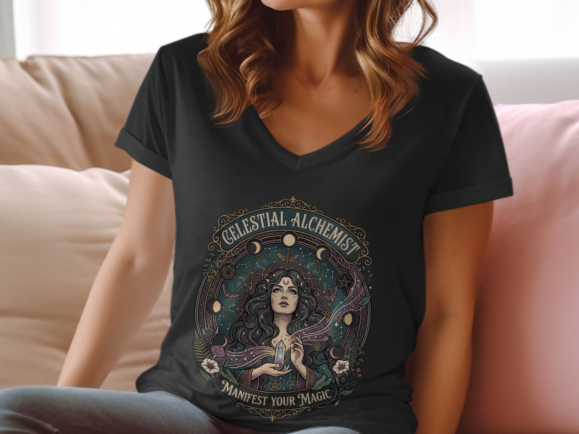 Black v-neck t-shirt with celestial alchemist woman graphic and text.