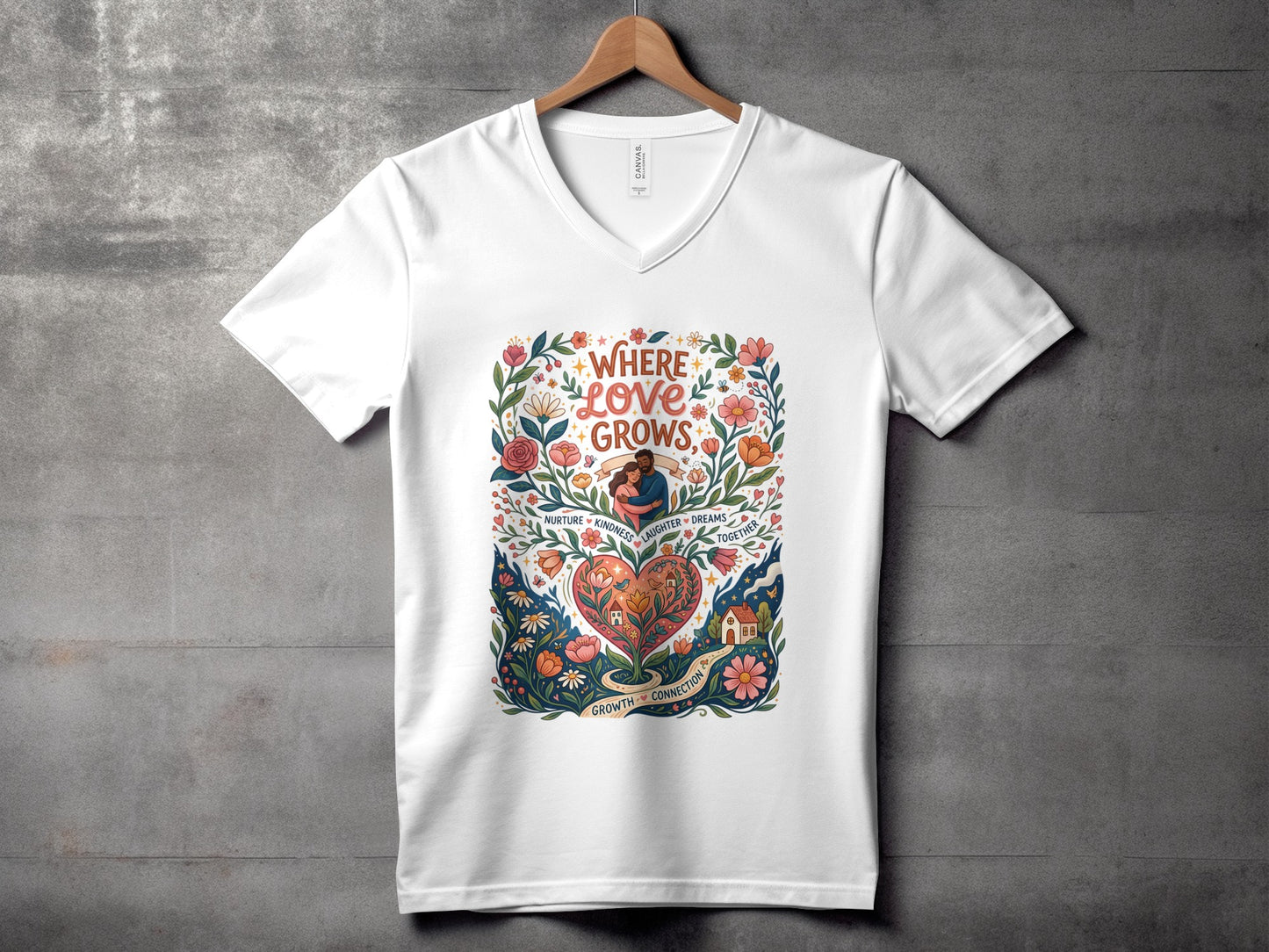 White t-shirt with floral heart design and text "Where Love Grows".