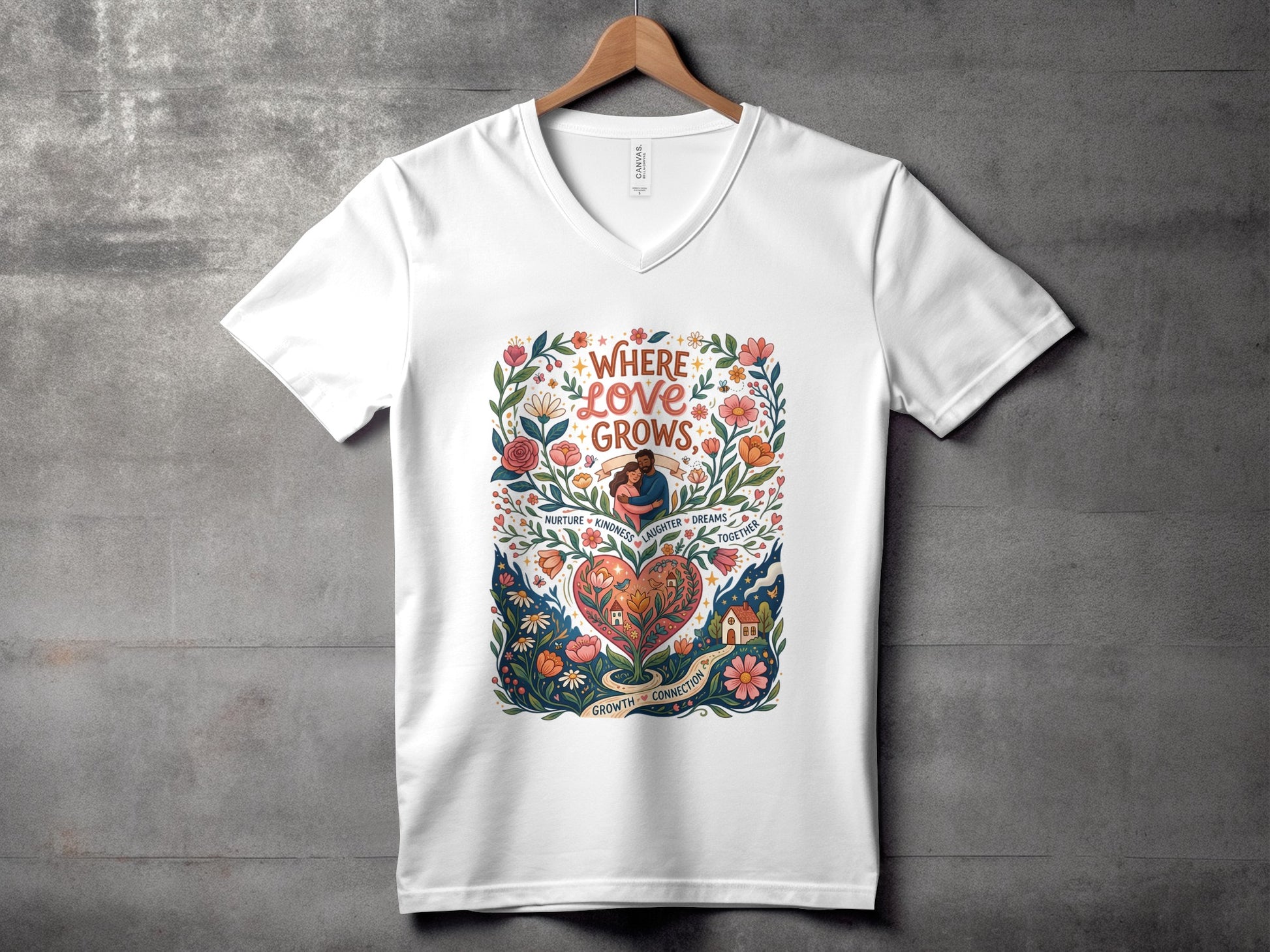 White t-shirt with floral heart design and text "Where Love Grows".