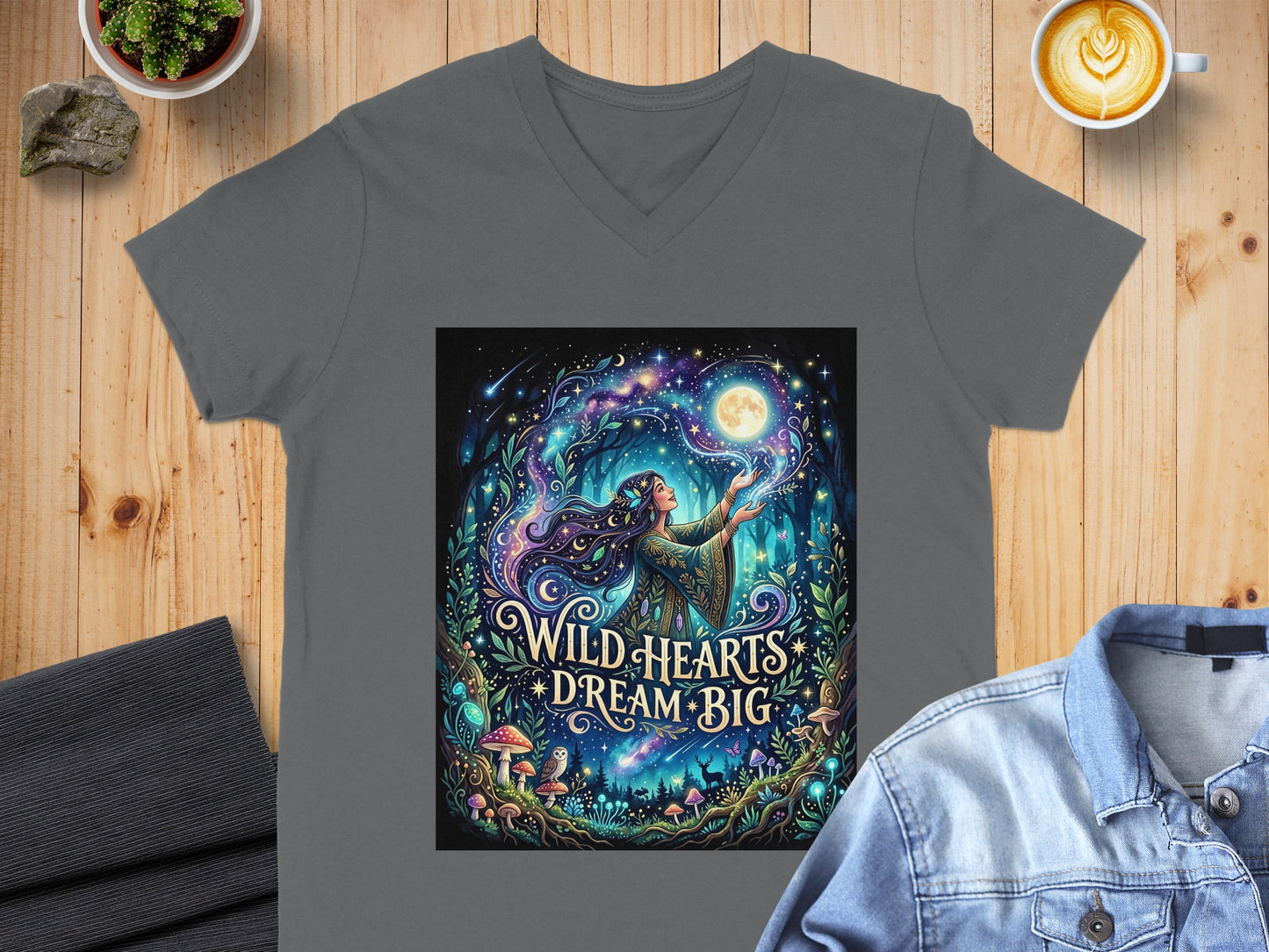 Woman with flowing hair under moon, surrounded by nature and text "Wild Hearts Dream Big."
