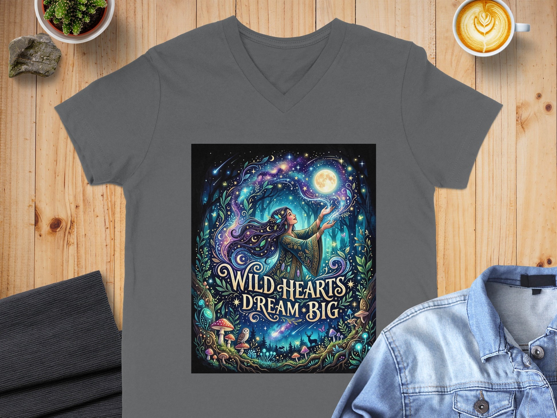 Woman with flowing hair under moon, surrounded by nature and text "Wild Hearts Dream Big."