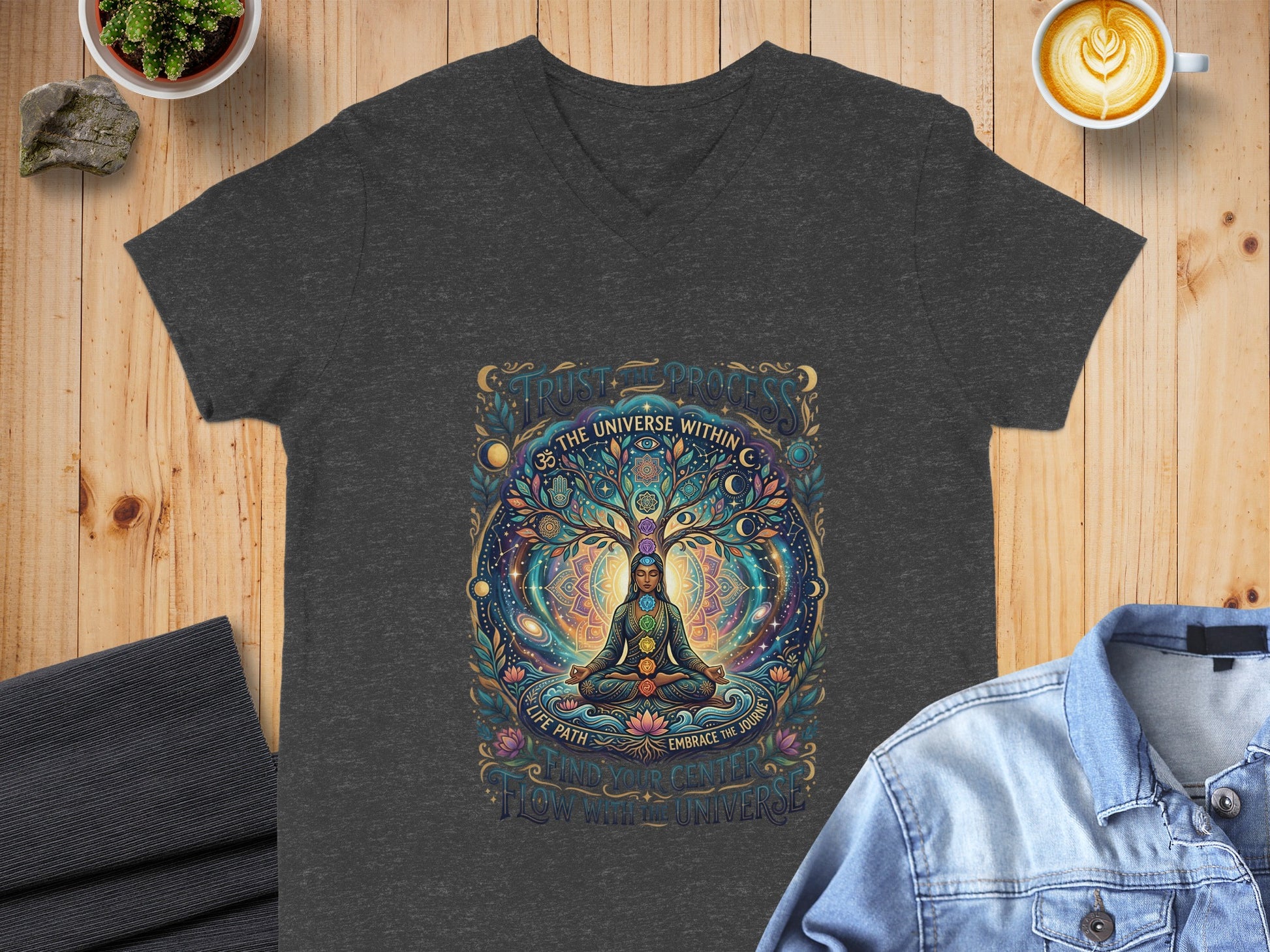 T-shirt with a colorful mandala tree of life and chakra symbols.