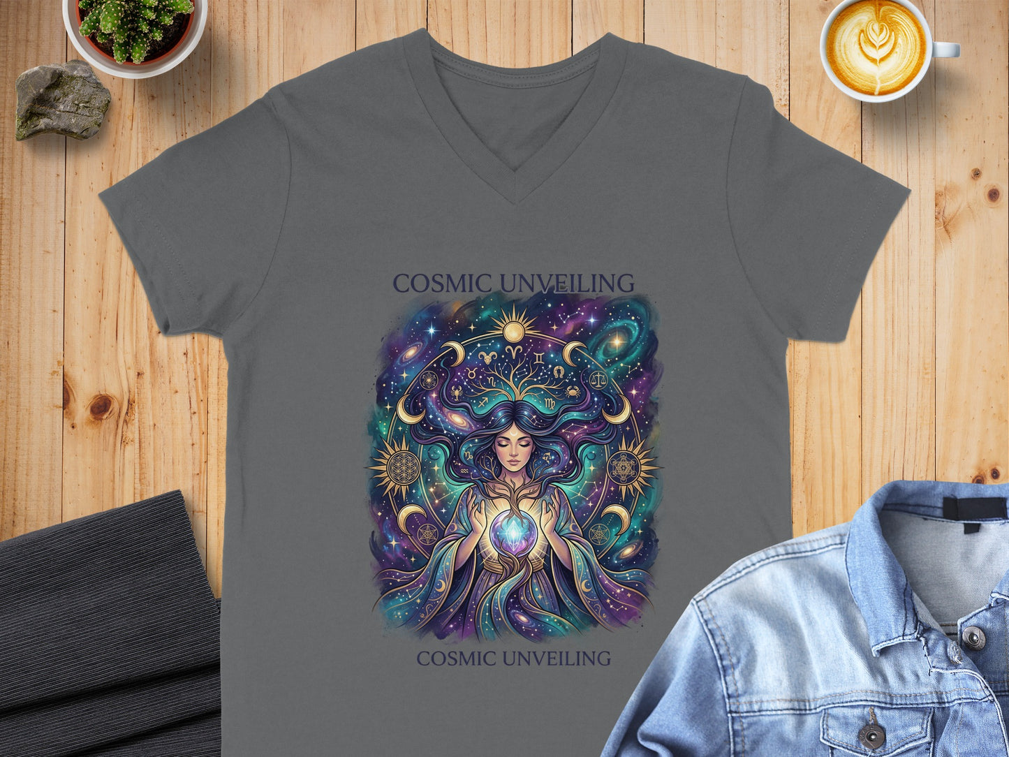 T-shirt with cosmic unfolding goddess artwork and text.