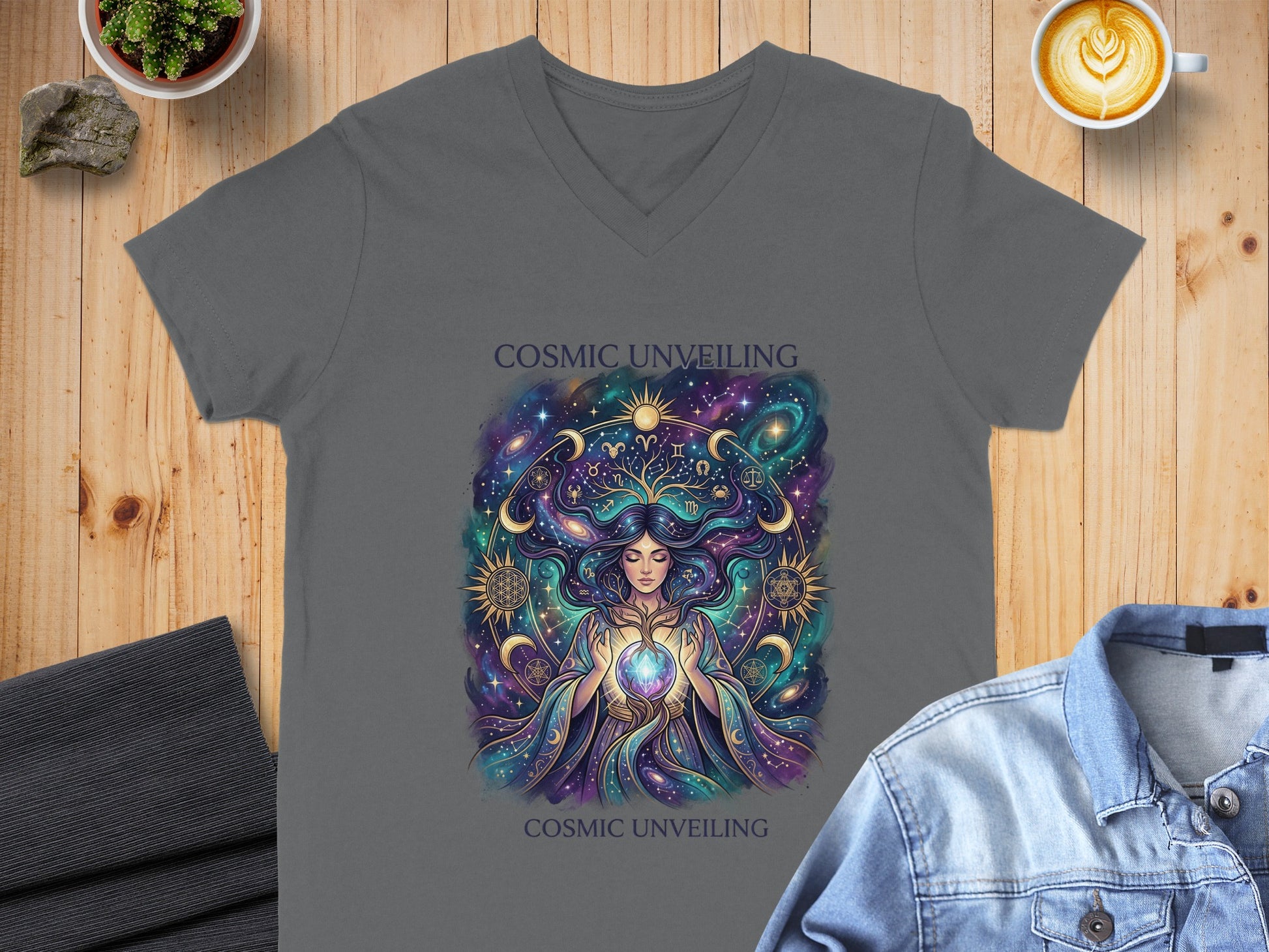 T-shirt with cosmic unfolding goddess artwork and text.