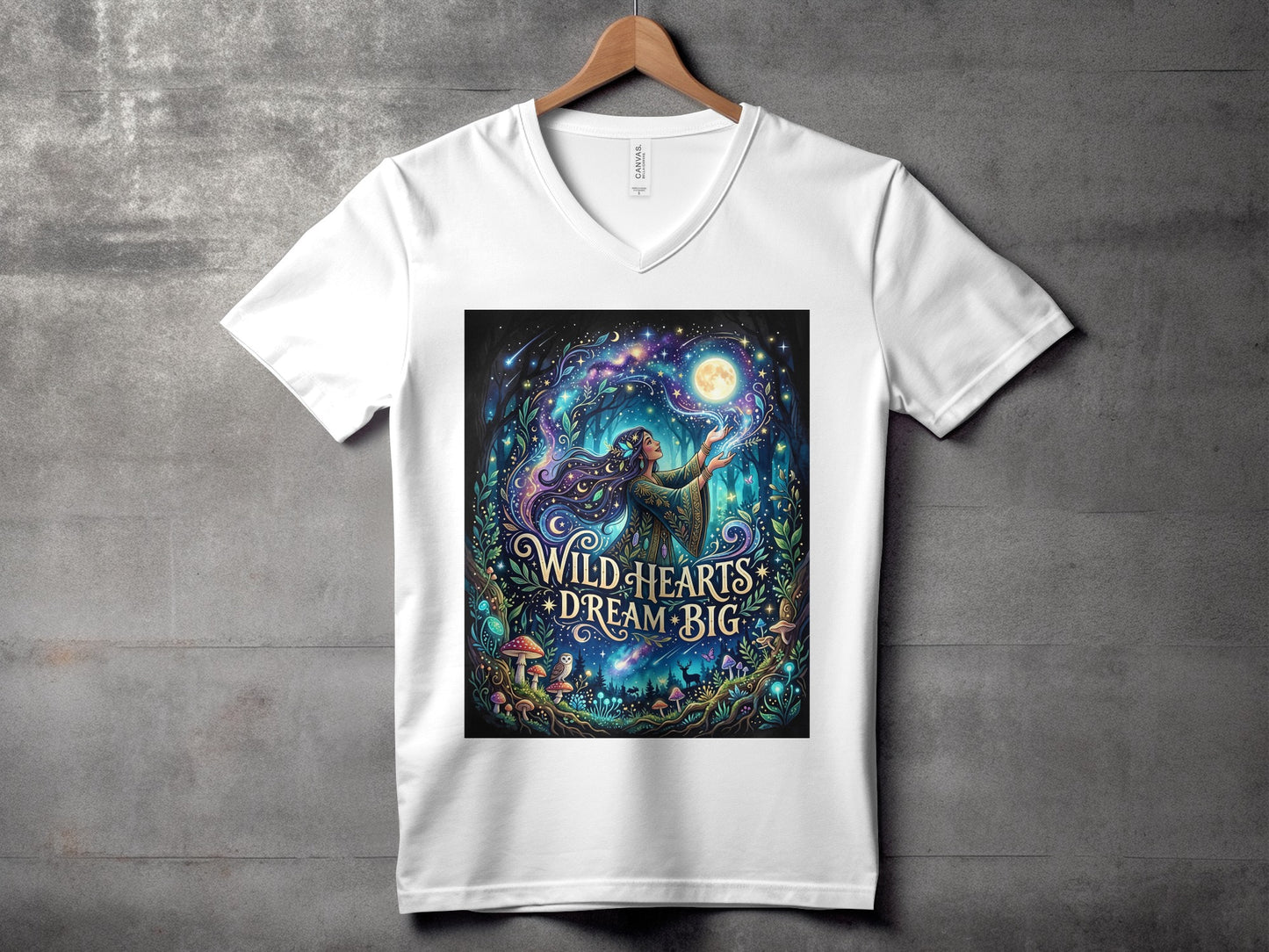 White t-shirt featuring a mystical forest scene with a woman holding a moon.