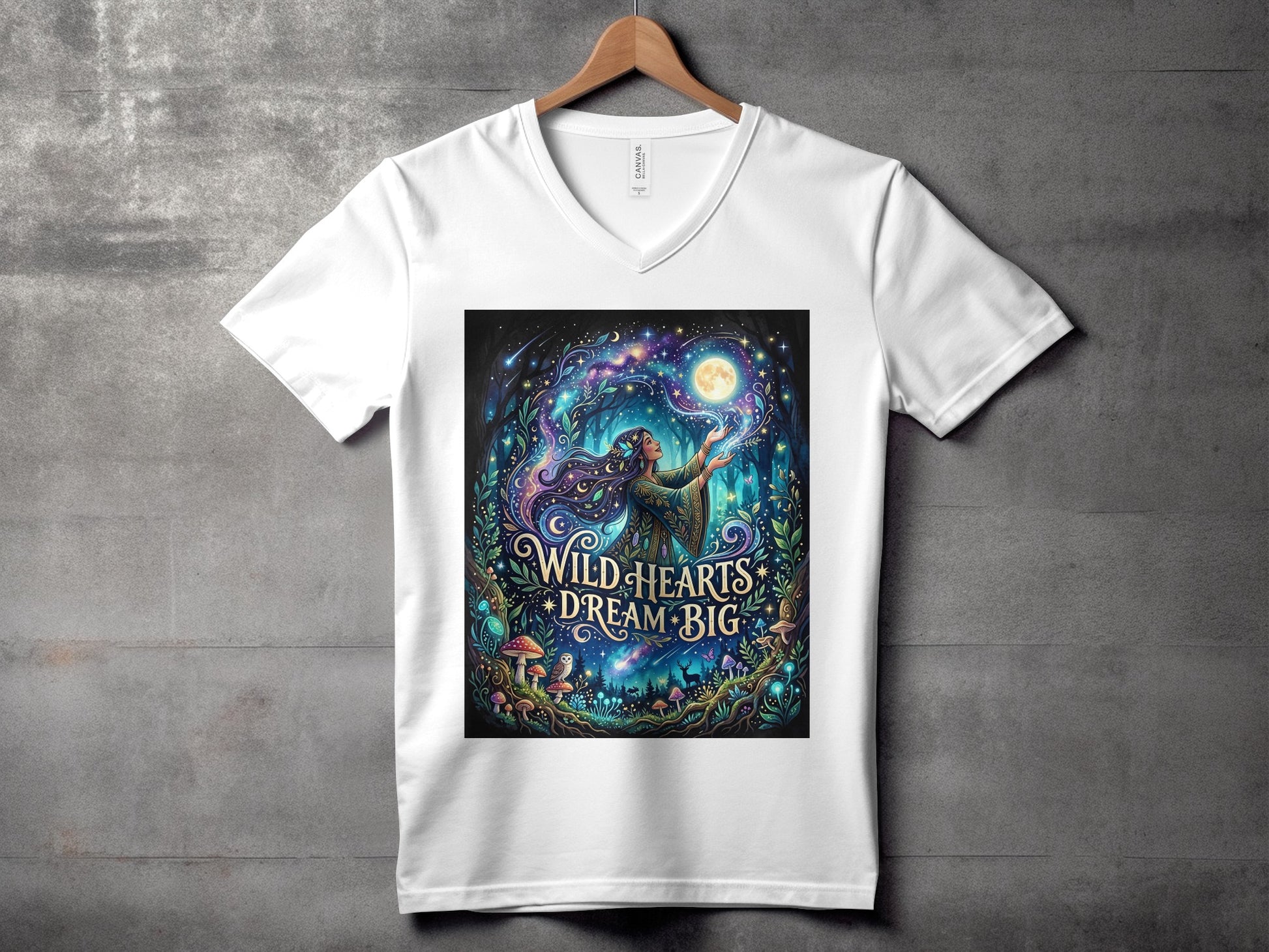 White t-shirt featuring a mystical forest scene with a woman holding a moon.