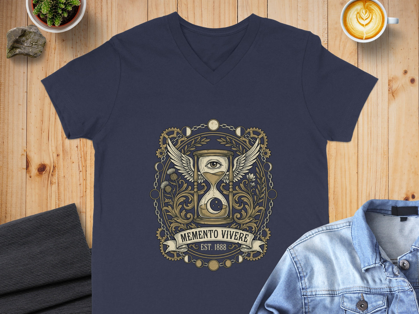 Navy v-neck t-shirt with Memento Vivere hourglass emblem, EST. 1888.