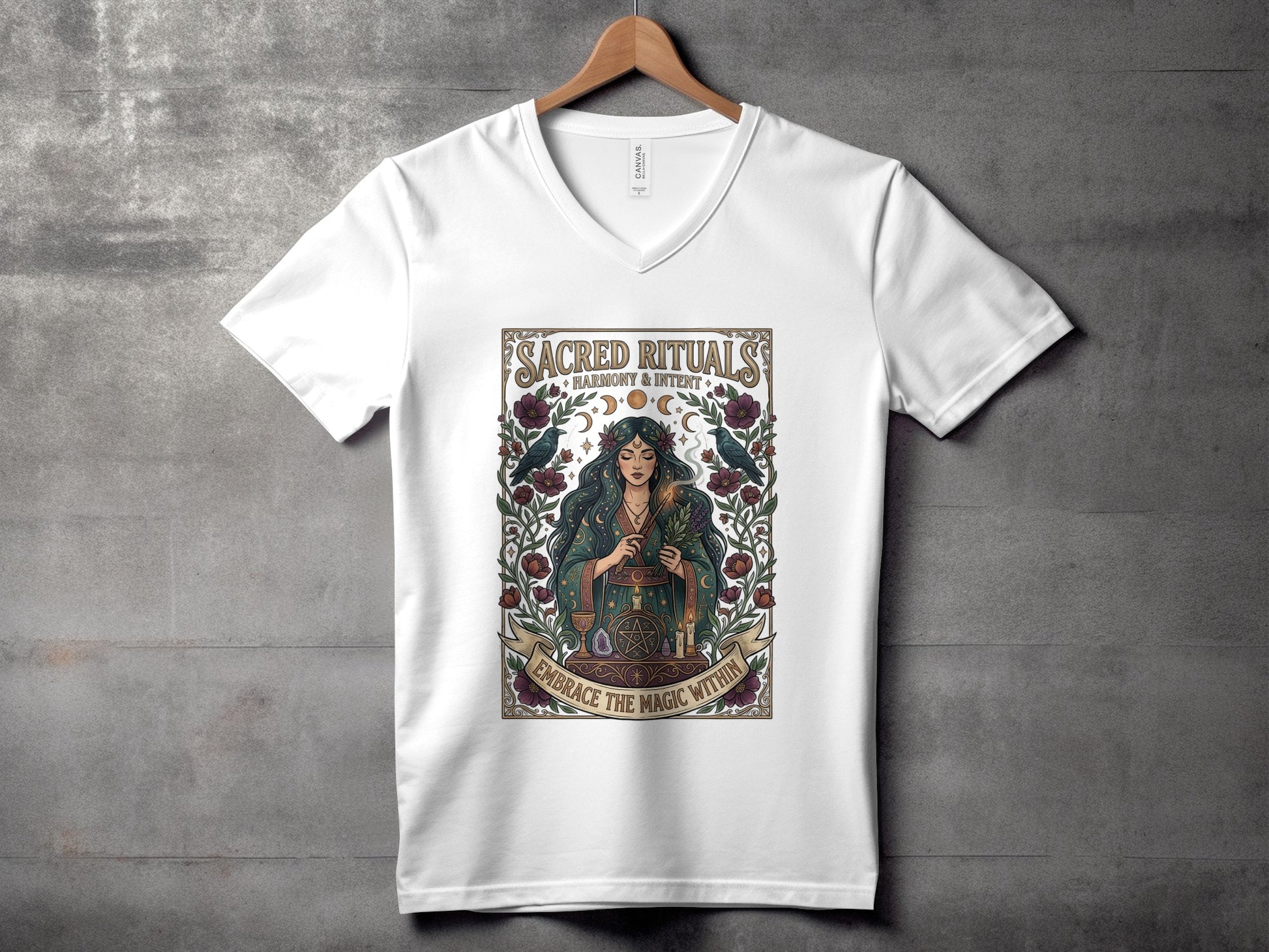 White t-shirt with "Sacred Rituals Harmony & Intent Embrace the Magic Within" graphic.