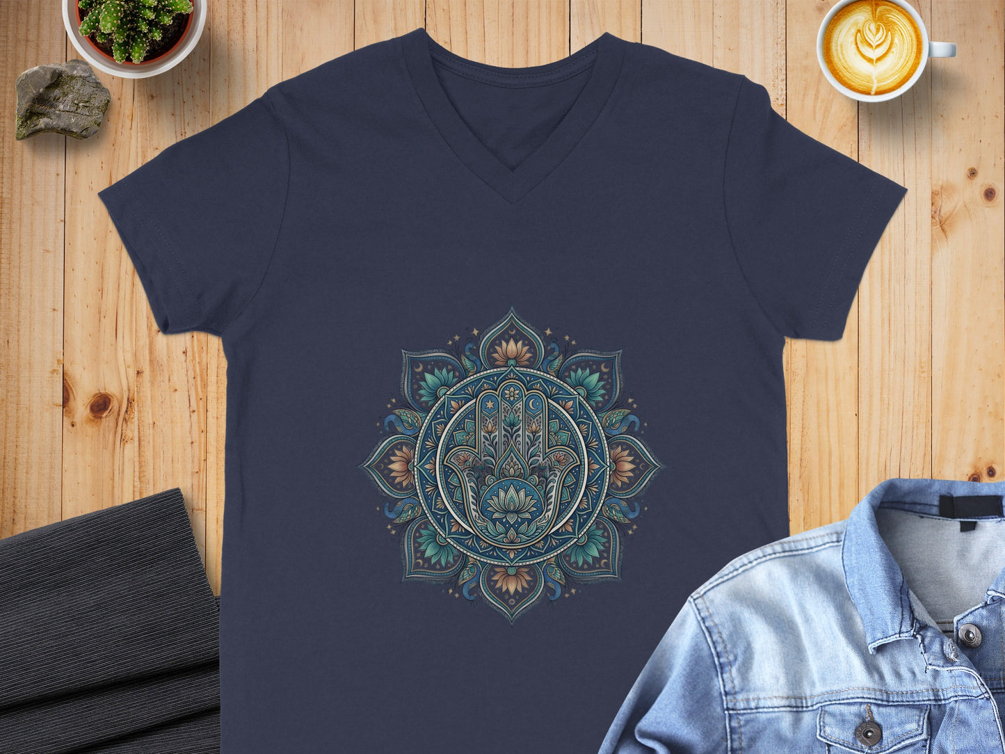 Navy v-neck t-shirt with colorful Hamsa hand mandala design.