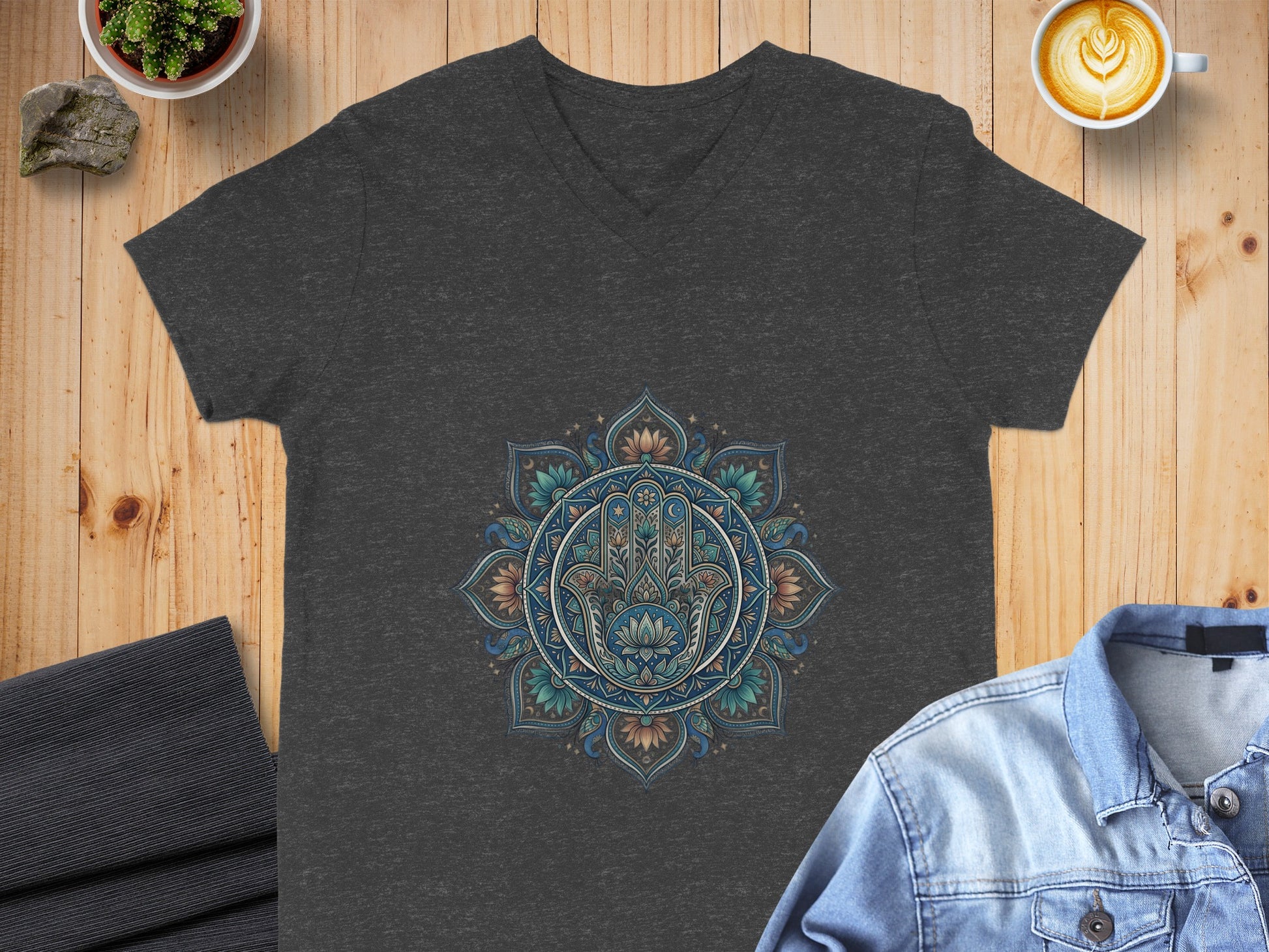 Dark grey v-neck t-shirt with Hamsa hand mandala design.