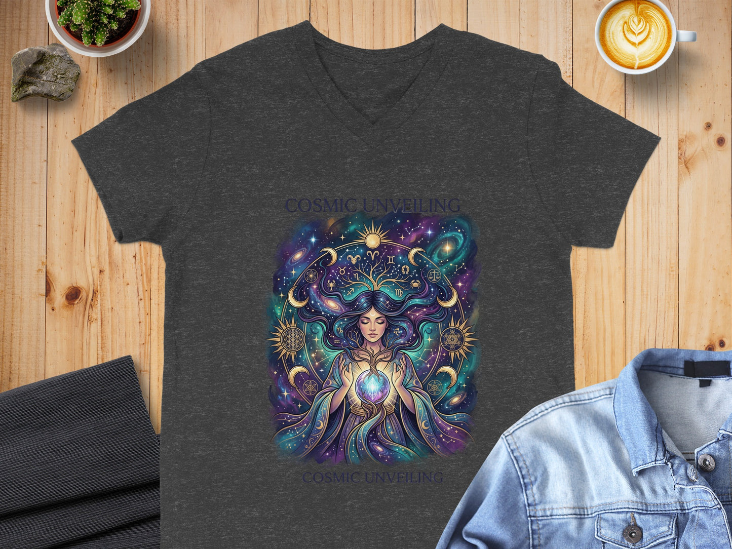 Dark grey t-shirt featuring a cosmic woman illustration with celestial elements.