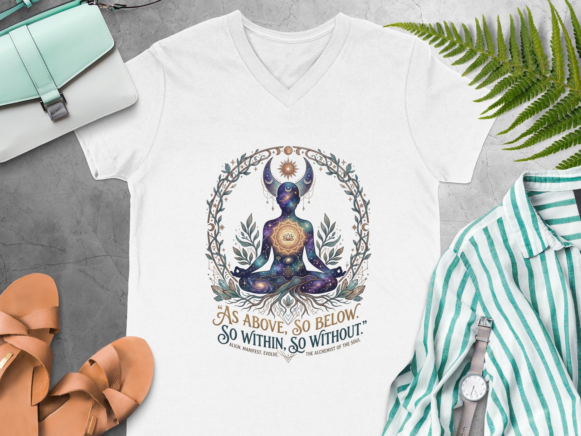 White t-shirt with celestial meditating figure and inspirational quote.
