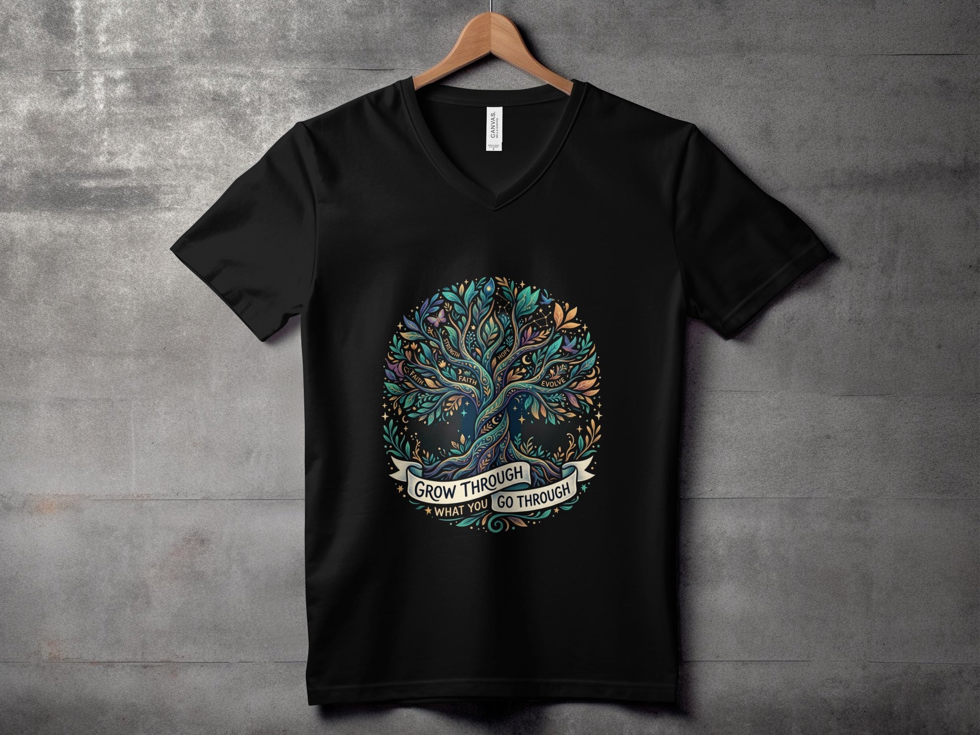 Black t-shirt with "Grow Through What You Go Through" and a decorative tree.